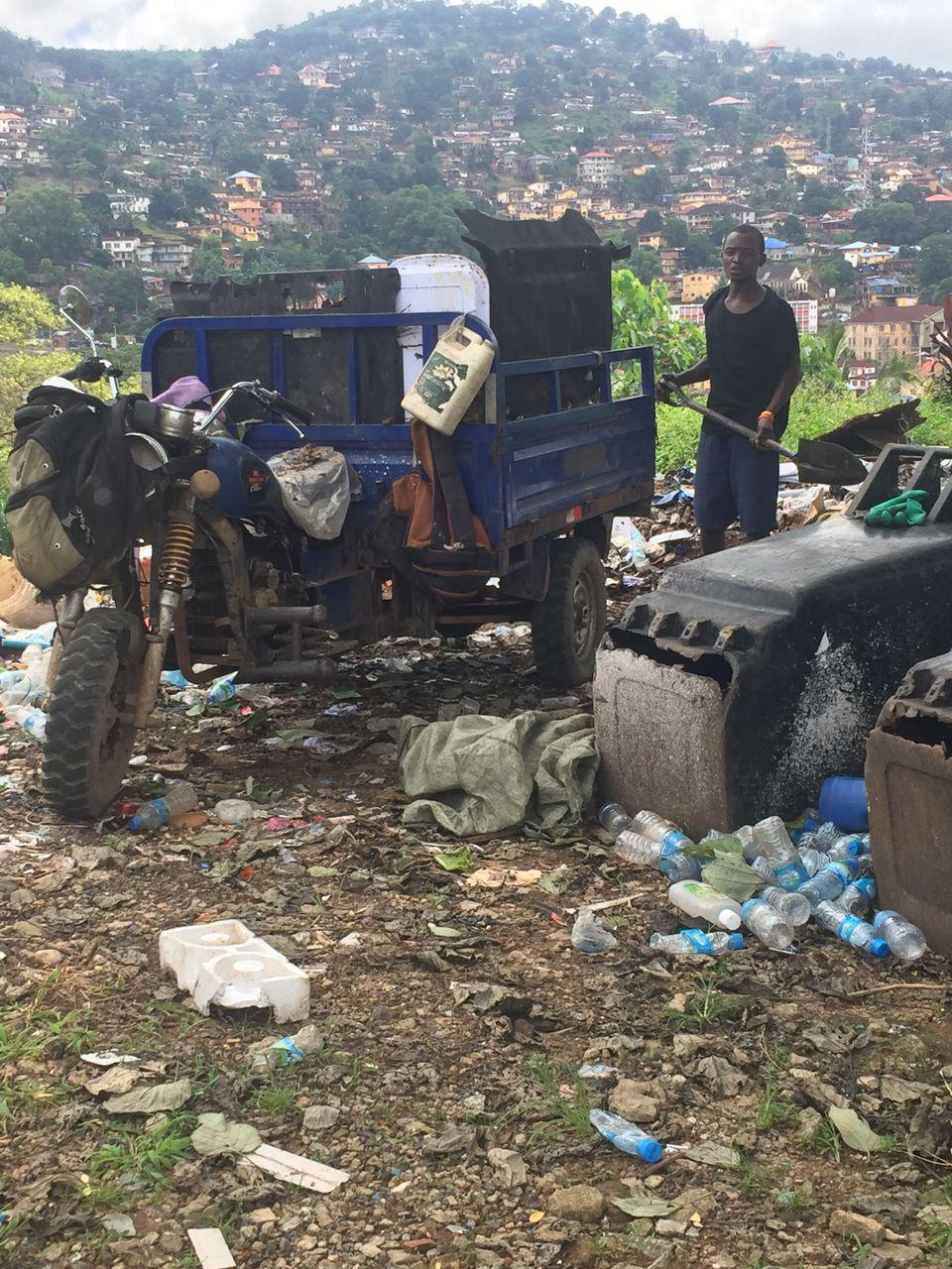Jaques helping with community waste collection, Freetown 2024